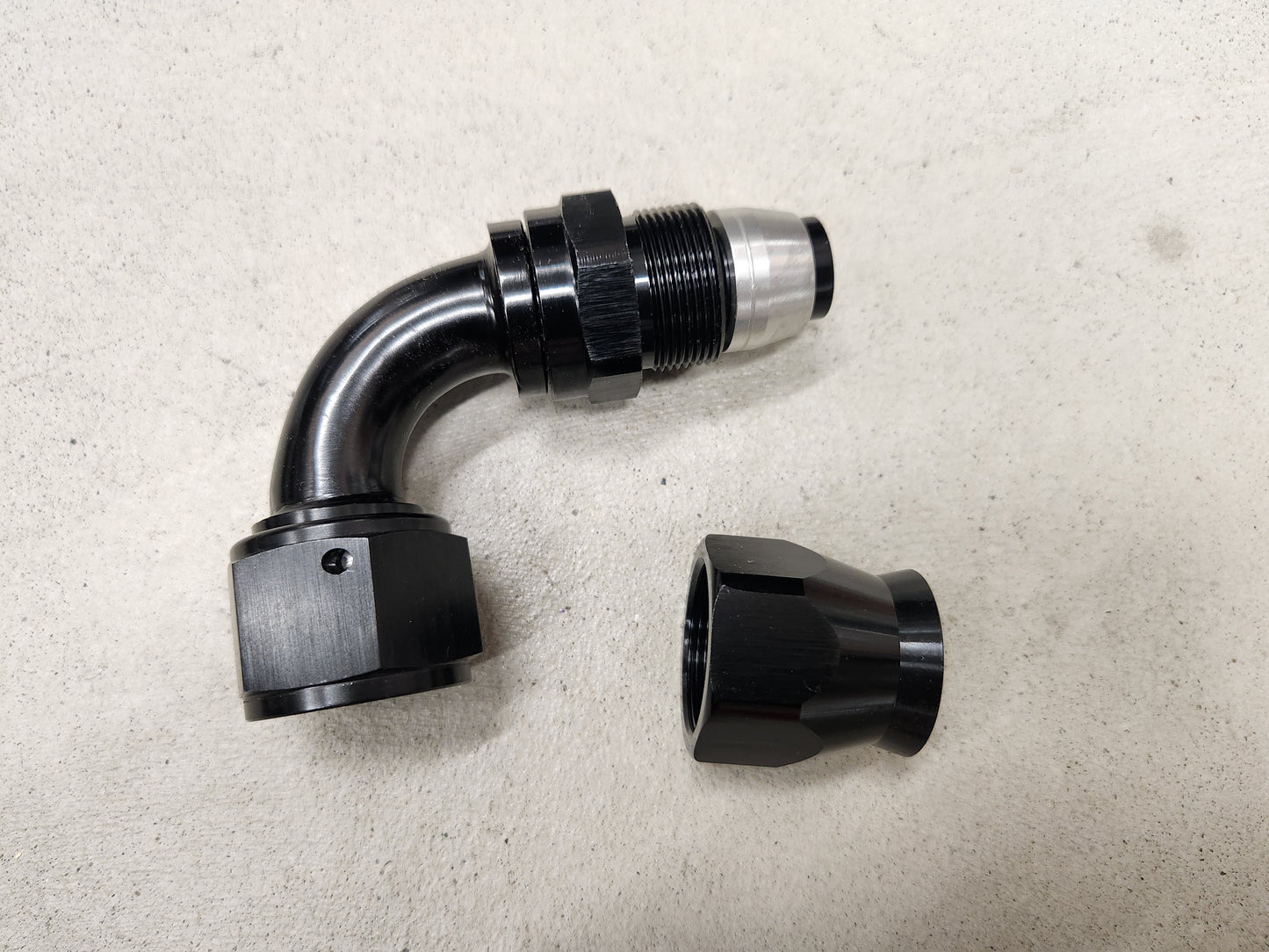 90° AN12 PTFE liitin x1